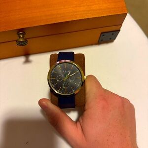 Ted Baker Watch. Blue leather band. Blue face with gold outline.